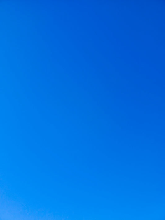 a group of people standing on top of a snow covered slope