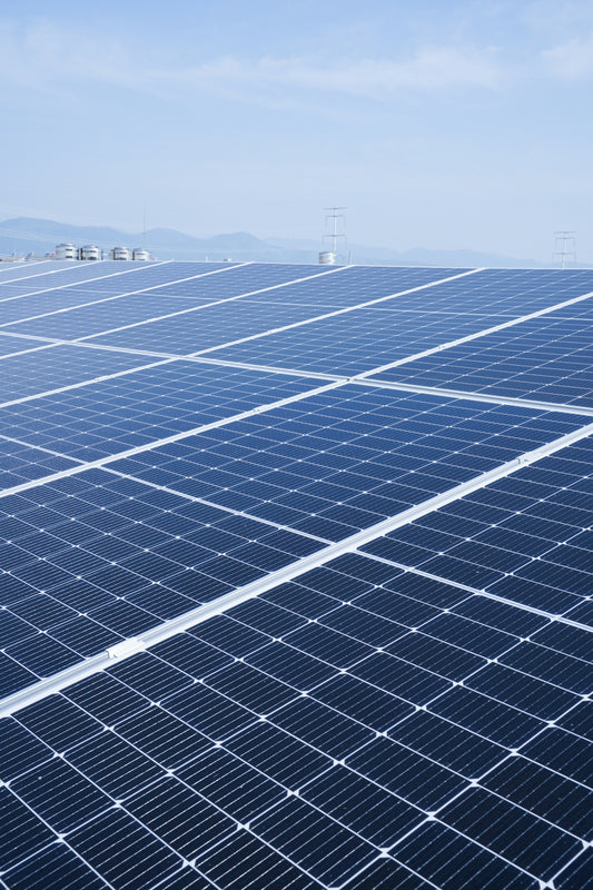 a large solar panel with a sky background