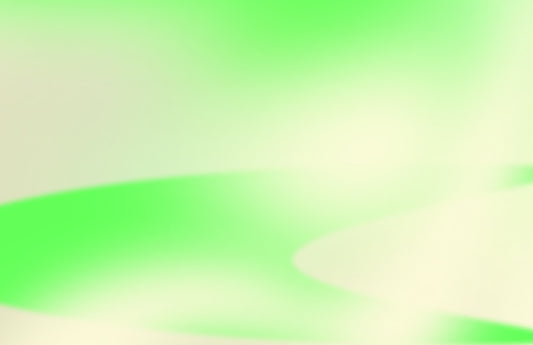 a blurry image of a green and white background