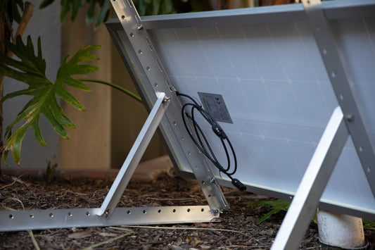 a metal frame with a power cord attached to it
