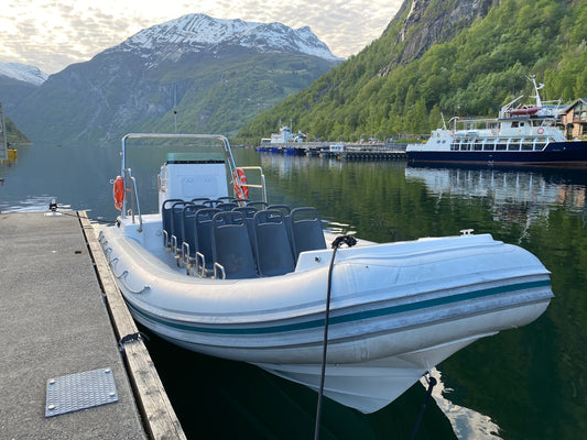 a boat is tied up to a dock