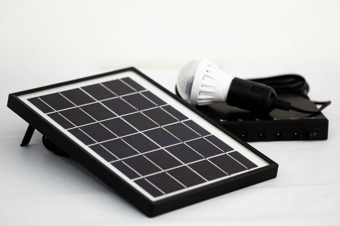 a solar panel with a light bulb on top of it