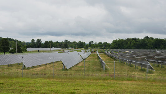 Solar panels generate renewable energy in a field.