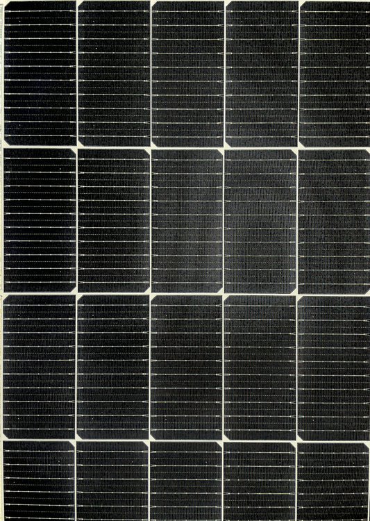 A black and white photo of a solar panel
