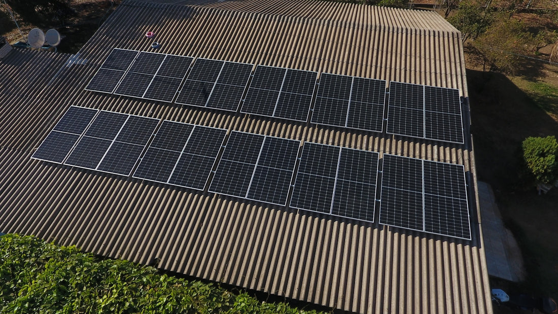 Solar panels are installed on a rooftop.