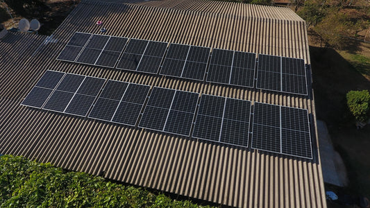 Solar panels are installed on a rooftop.